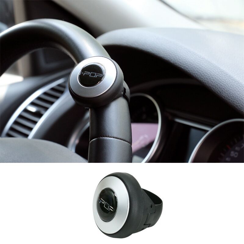 Car steering wheel spinner knob accessory in black and silver, quality driving tool