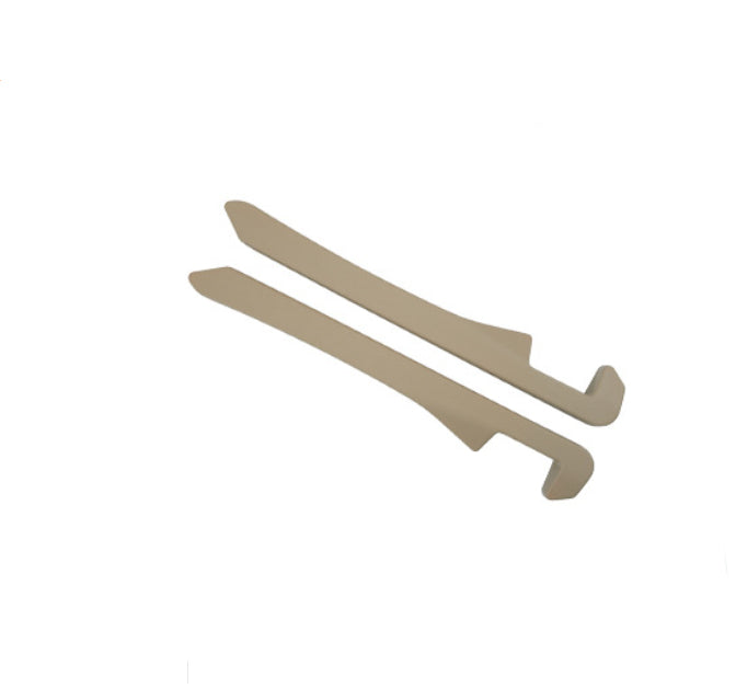 Pair of beige plastic hooks on white background, useful household accessory from sps street style