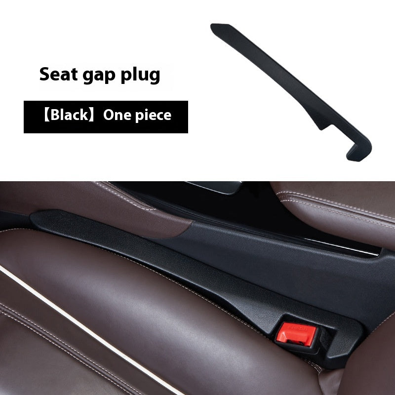 Black seat gap plug installed in car, prevents items falling between seats