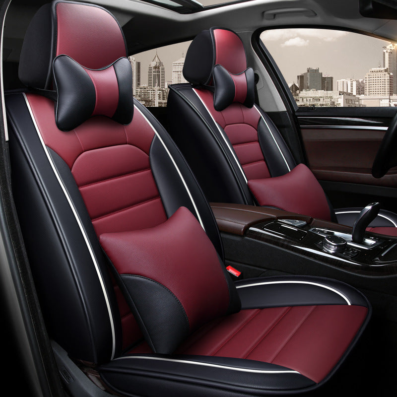 Luxury car interior with red and black leather seat covers and ergonomic pillows, sps street style