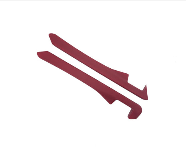 Pair of red plastic trim removal tools on white background, quality useful item for sps street style