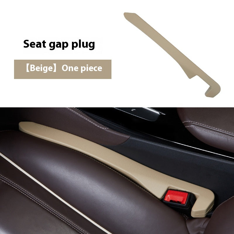 Beige seat gap plug for car, fits between brown leather seat and console