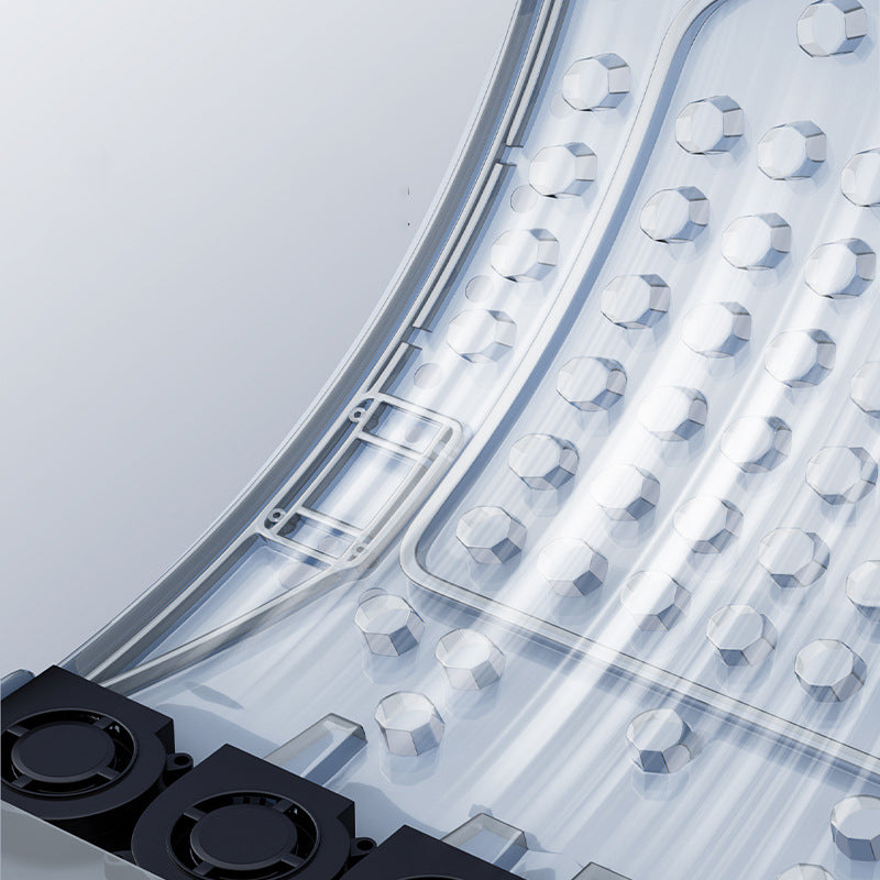 Close-up of a transparent, textured plastic mat with hexagonal grips and black corner pieces