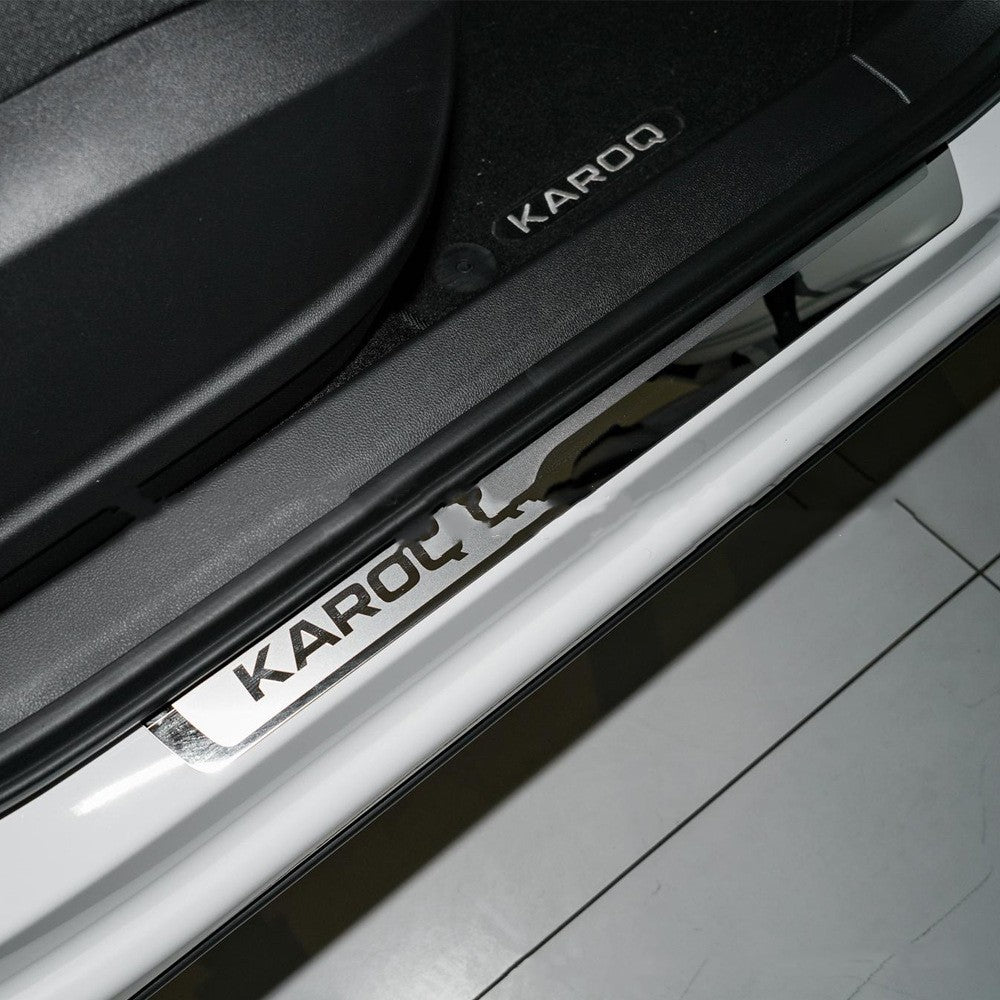 KAROQ stainless steel door sill protector and branded floor mat in car interior