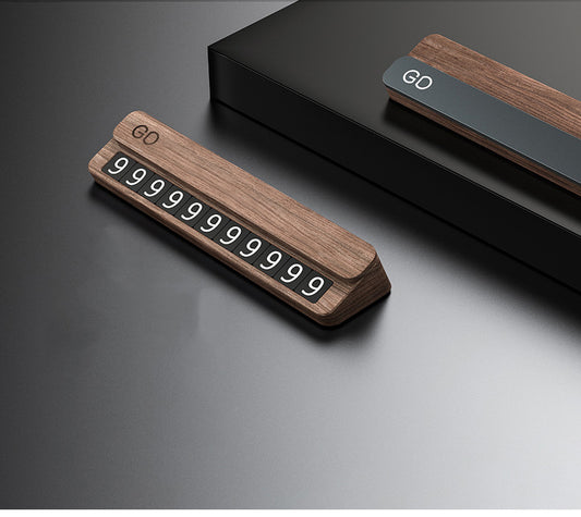 Wooden desk accessory with 'GO' label and number display, modern black background, sps street style