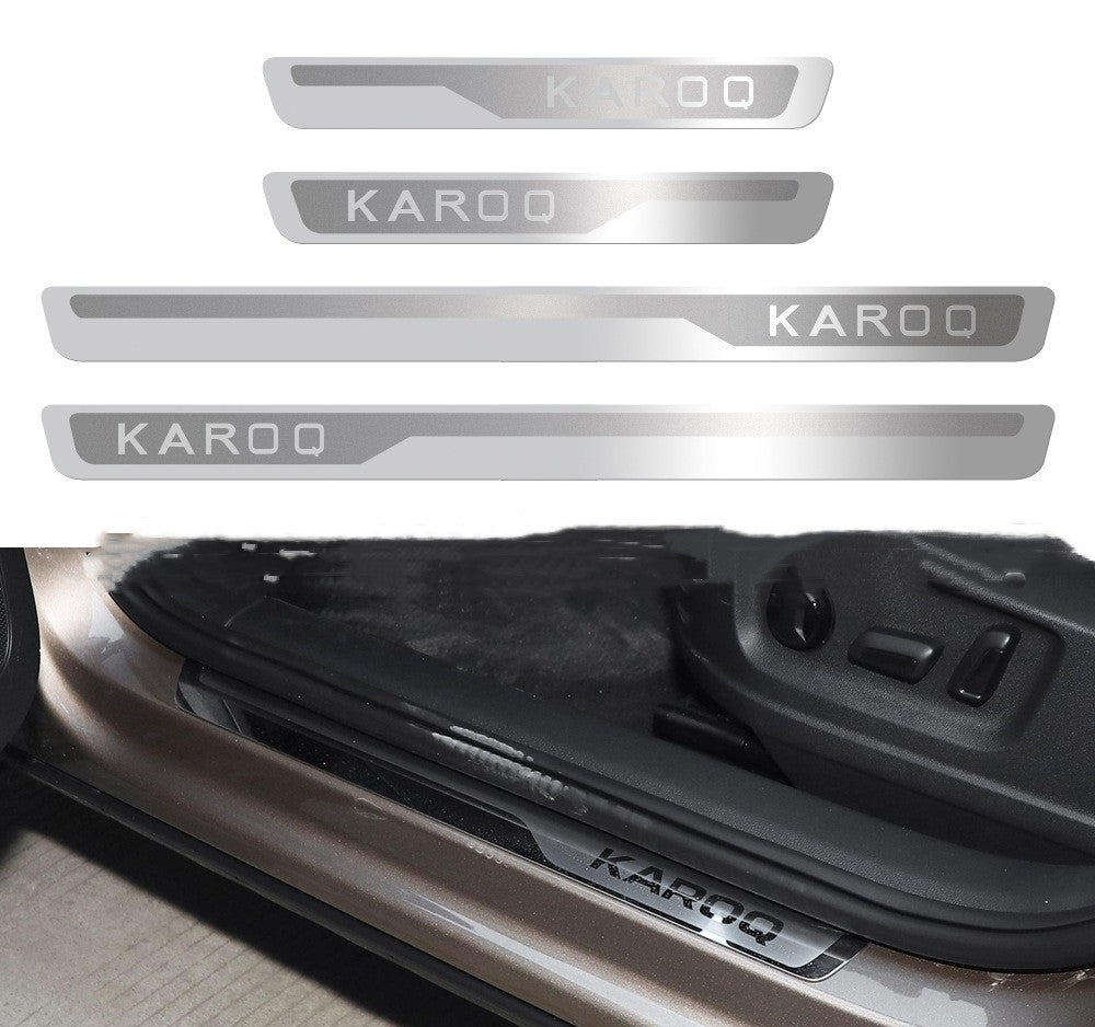 Silver KAROQ car door sill protectors installed on vehicle interior, street style accessory