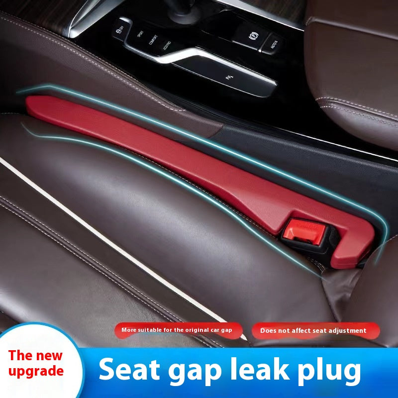 Car seat gap leak plug in red installed between brown leather seats, sps street style accessory